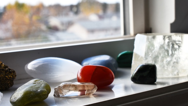 Healing crystals arranged in window