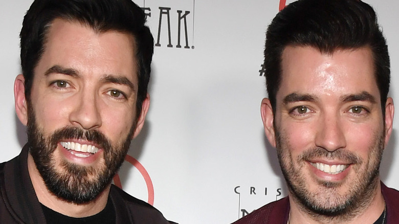 Jonathan and Drew Scott smiling close-up