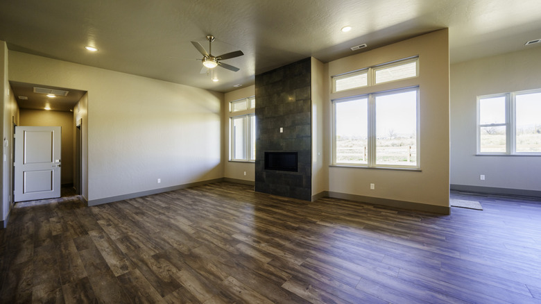 empty home with warm brown vinyl floors