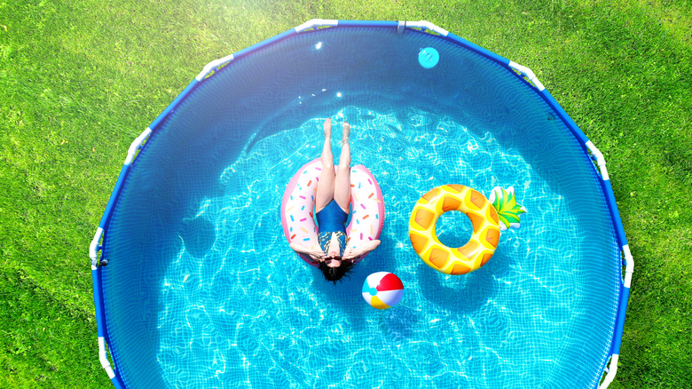 woman in blue pool