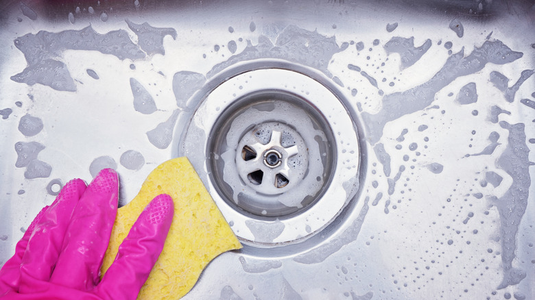 Hand cleaning kitchen drain