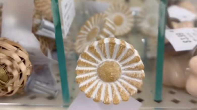 A whitewashed flower knob at Hobby Lobby