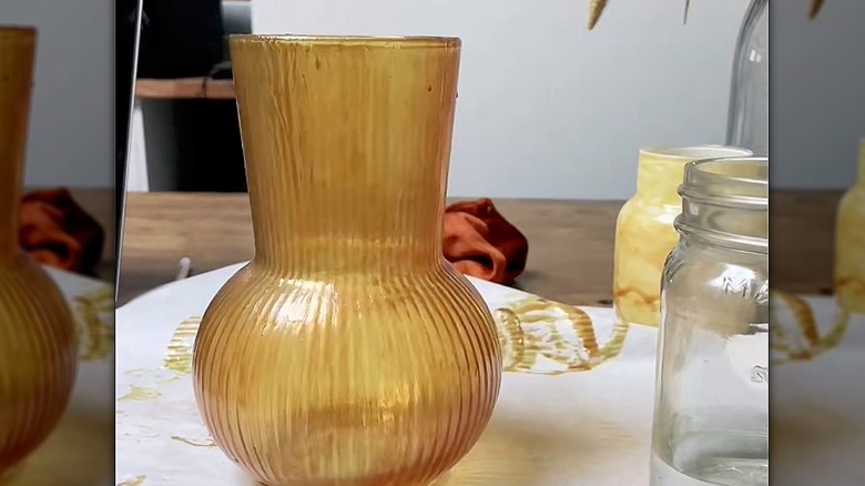A finished vase with an amber treatment