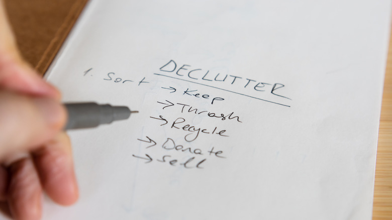 Someone going through their declutter tasks