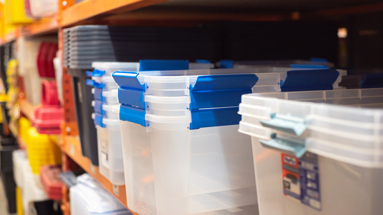 Shelves with storage bins in store