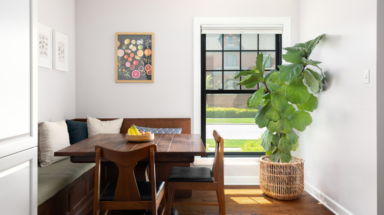 A bright but cozy breakfast nook, ready to be transformed into a breakfast bar with an accent wall.