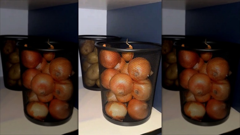 Potatoes and onions stored in mesh waste baskets