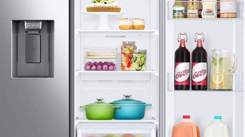 A close up of the Samsung side-by-side refrigerator interior with food inside
