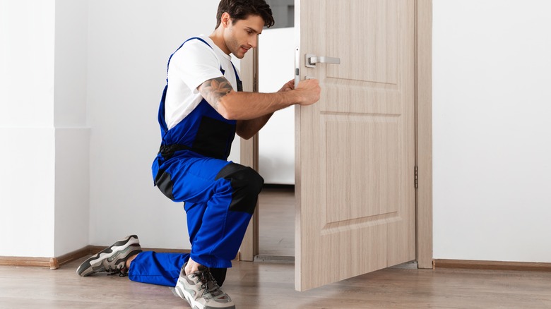 handyperson upgrading lock