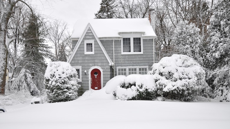 house with snow-covered roof