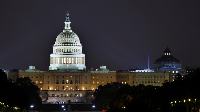The U.S. Capitol building is lit up at night in Washington D.C.