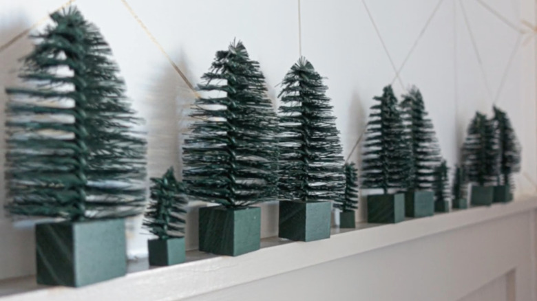 mini Christmas trees made from bristle brushes