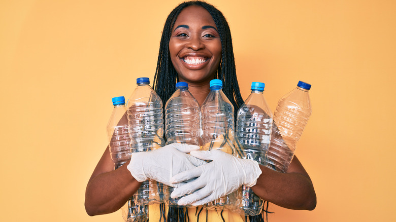 Woman holding bottles