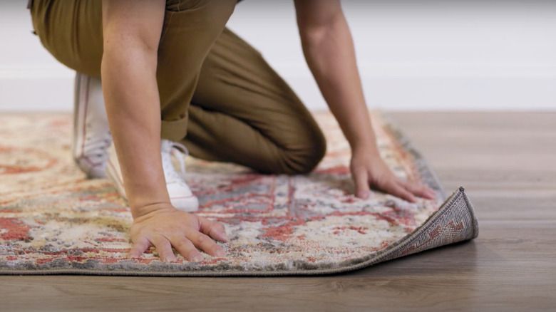 Woman shares hack to stop rug corners rolling up - which people