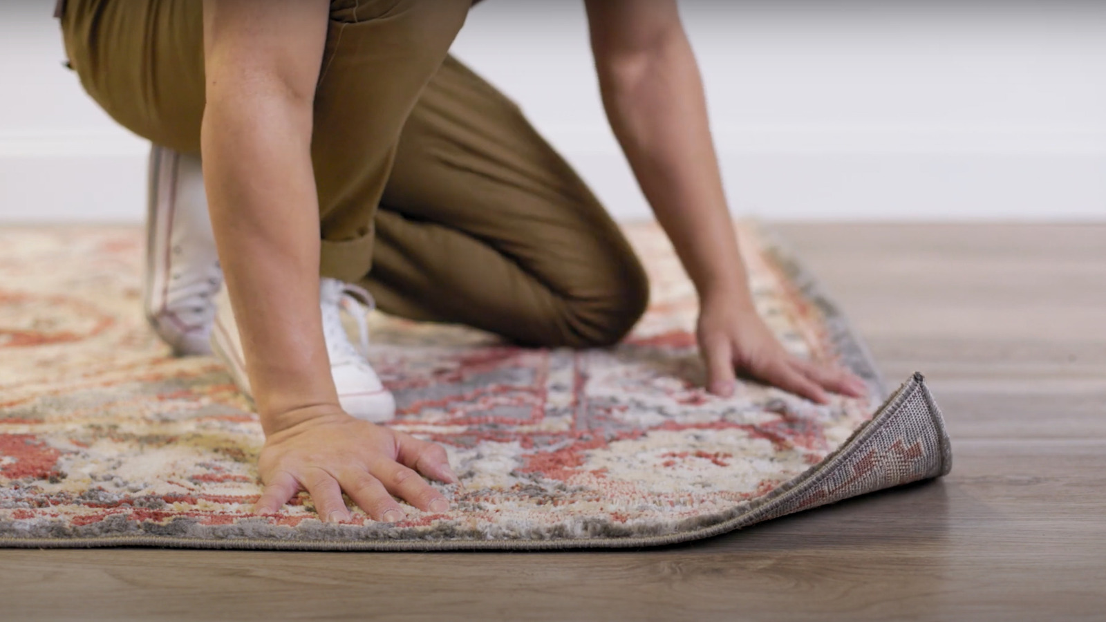 https://www.housedigest.com/img/gallery/this-tiktok-hack-flattens-a-curled-rug-corner-by-using-ice-cubes/l-intro-1685732323.jpg