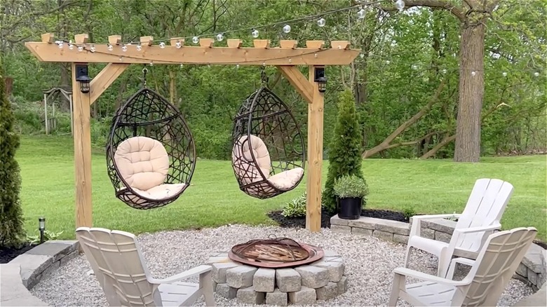 pergola with egg chair swings