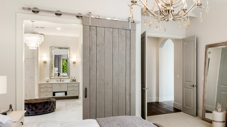 barn doors in farmhouse bedroom