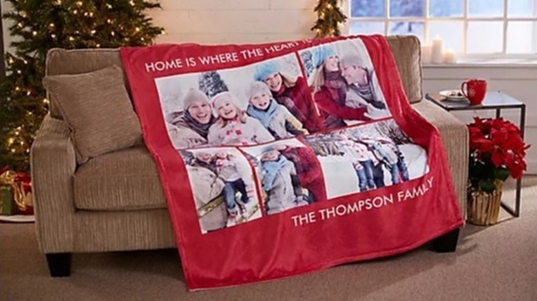 red photo blanket on couch 