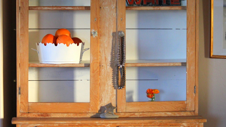 Antique rustic timber pie safe with decorative items