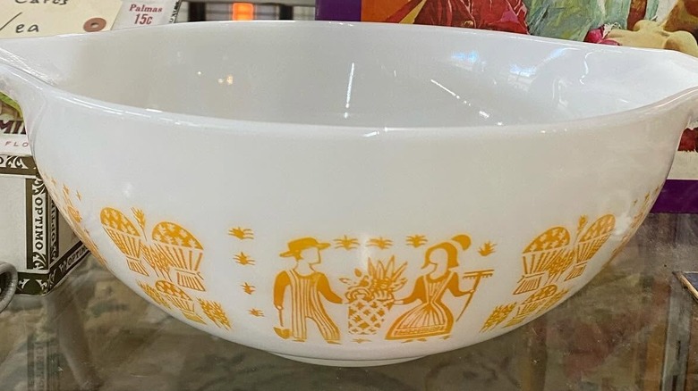 Large Pumpkin Butterprint Pyrex bowl for sale in an antique store.