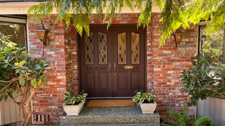 The front of a house with a Tudor-style door