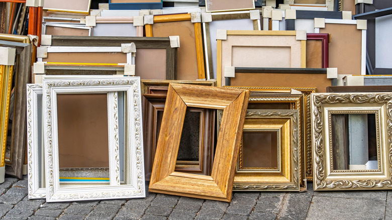 A group of vintage frames standing on the ground