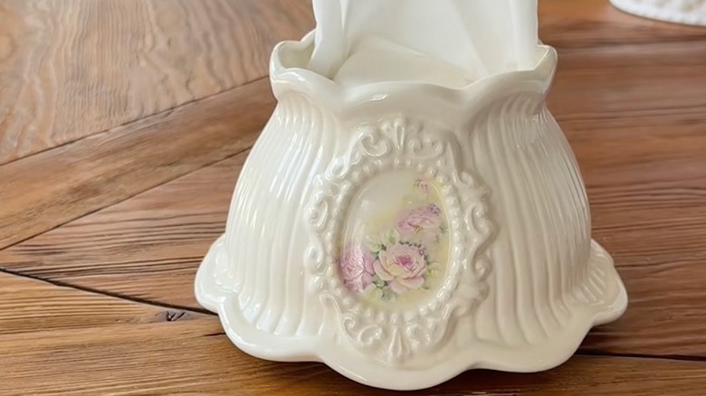 Vintage glass lampshade on a wood table