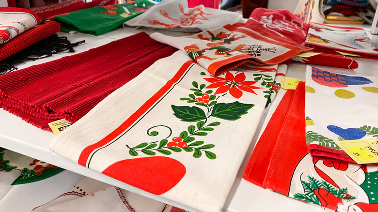 Vintage tablecloths for safe at a thrift store