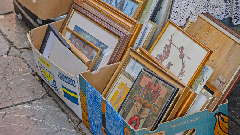 framed artwork in thrift store