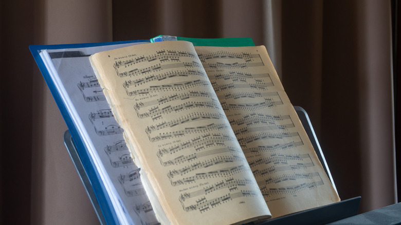 antique sheet music on stand
