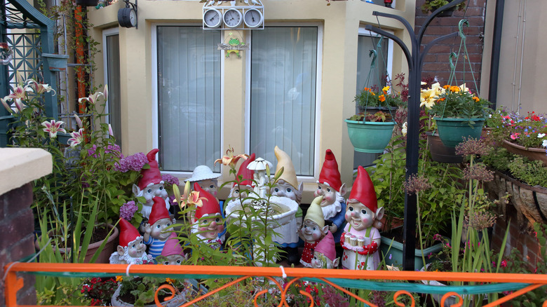 Front patio overcrowded with garden gnomes