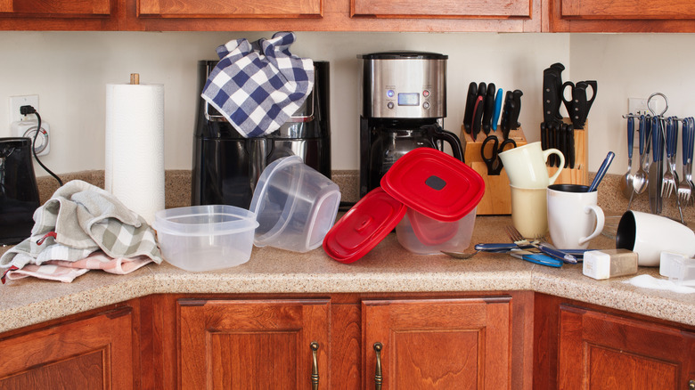 A messy kitchen countertop with baking essentials