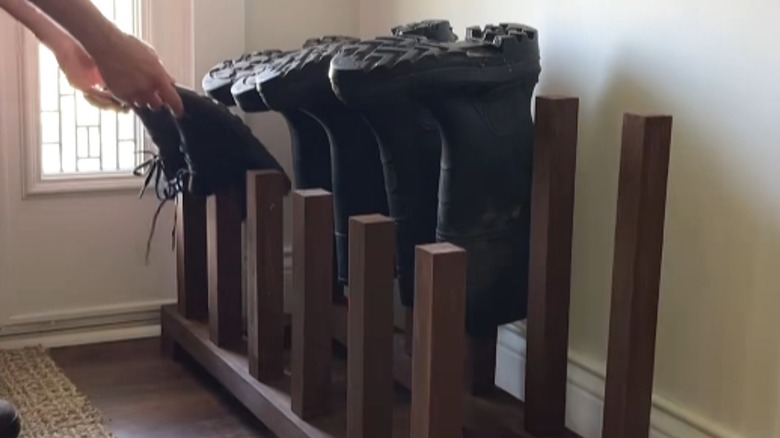 custom DIY boot rack in entryway