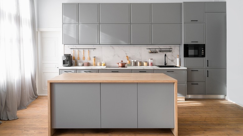 Kitchen with gray cabinets