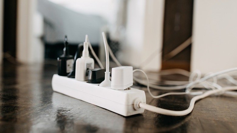 Power strip with cords plugged in