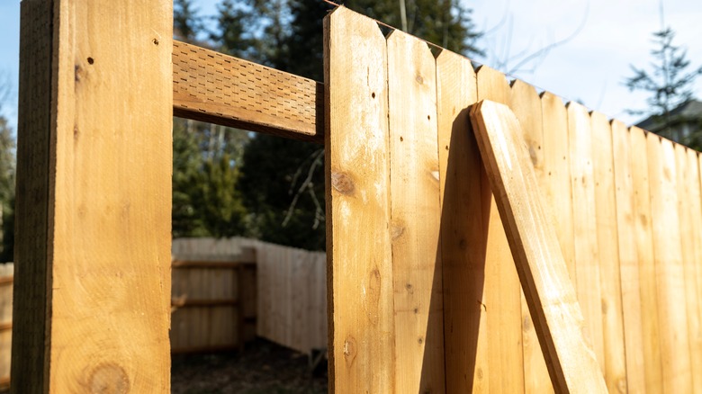 privacy fence being built