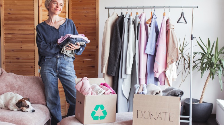 Person holding clothes