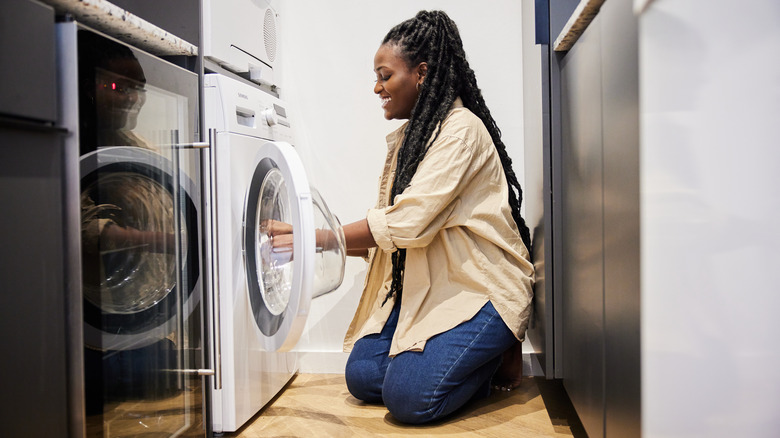 woman in front of dryer