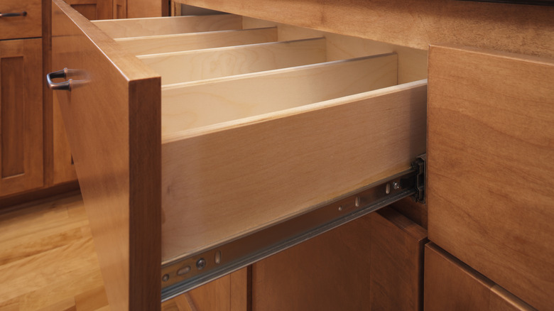 Kitchen cabinet drawer and slide