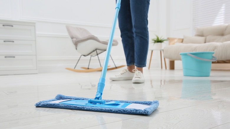 mopping floor with flat mop 
