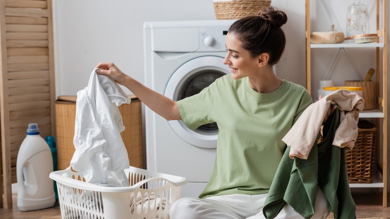 Person sorting laundry