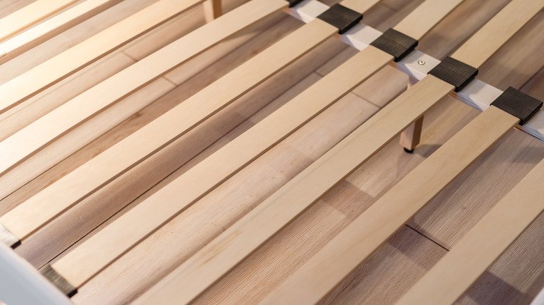 wooden bed slats in bed 