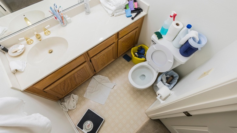 tiny messy half bath