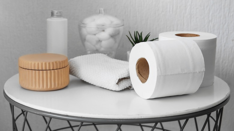Toilet paper rolls on table