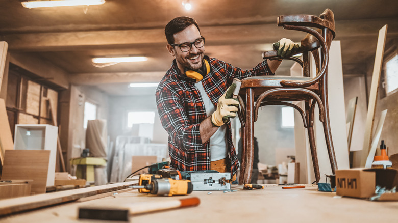 Man working on chair legs