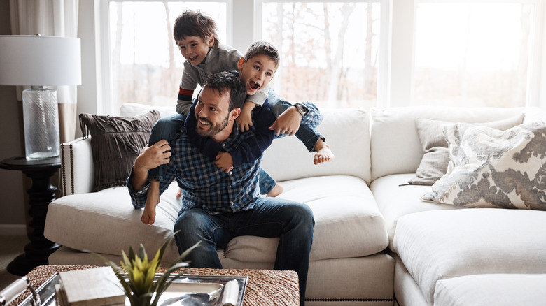 Dad playing with children