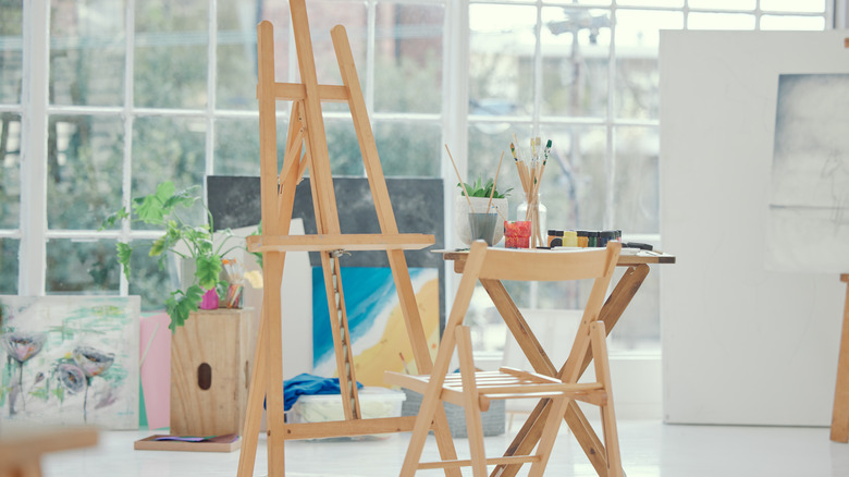 Art easel and table with paint