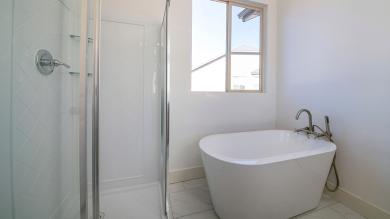 A white shower made of acrylic plastic