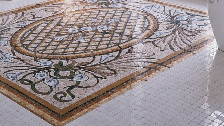 An intricate mosaic tile rug.