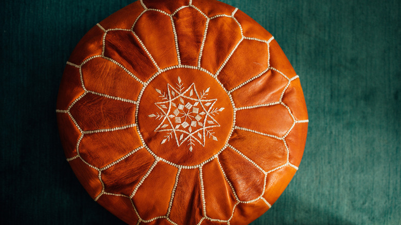 Brown goatskin covering a pouf